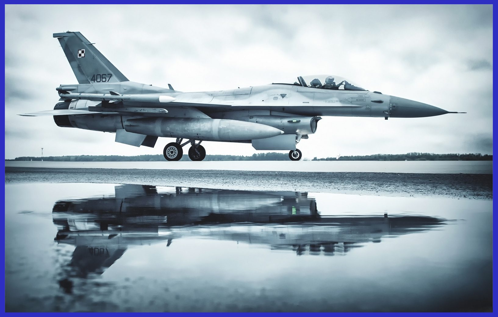 Photo Credit: Hesja Air-Art Photography / A Polish F-16 armed with AMRAAM before take-off.