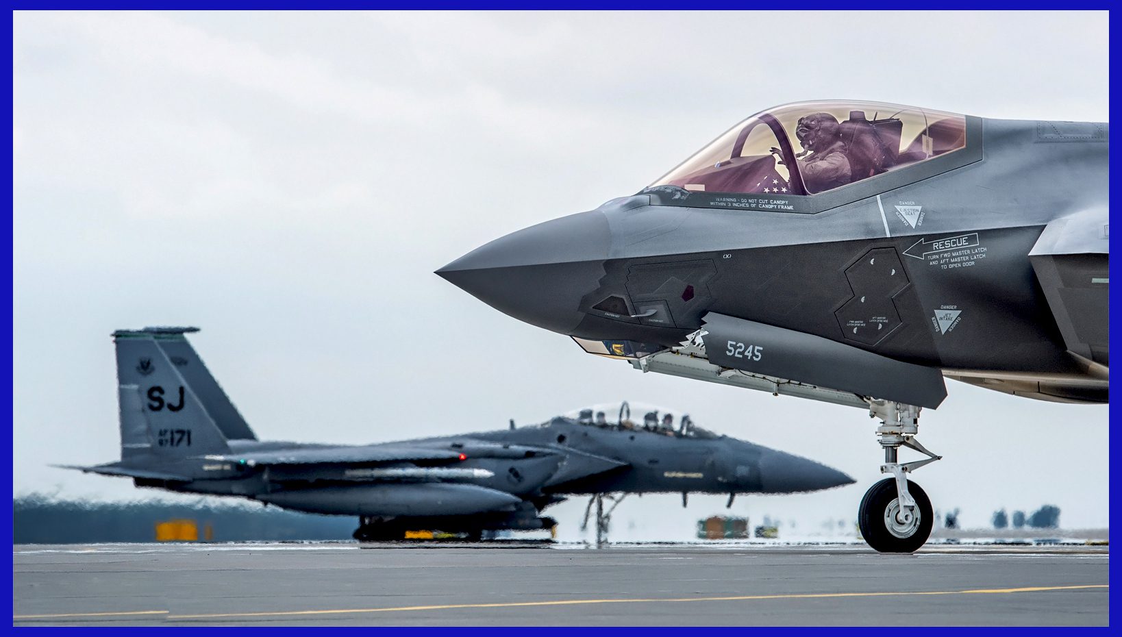 Photo Credit: Hesja Air-Art Photography / Proven technology challenges advanced technology. An F-15E participates in a common exercise alongside an F-35A