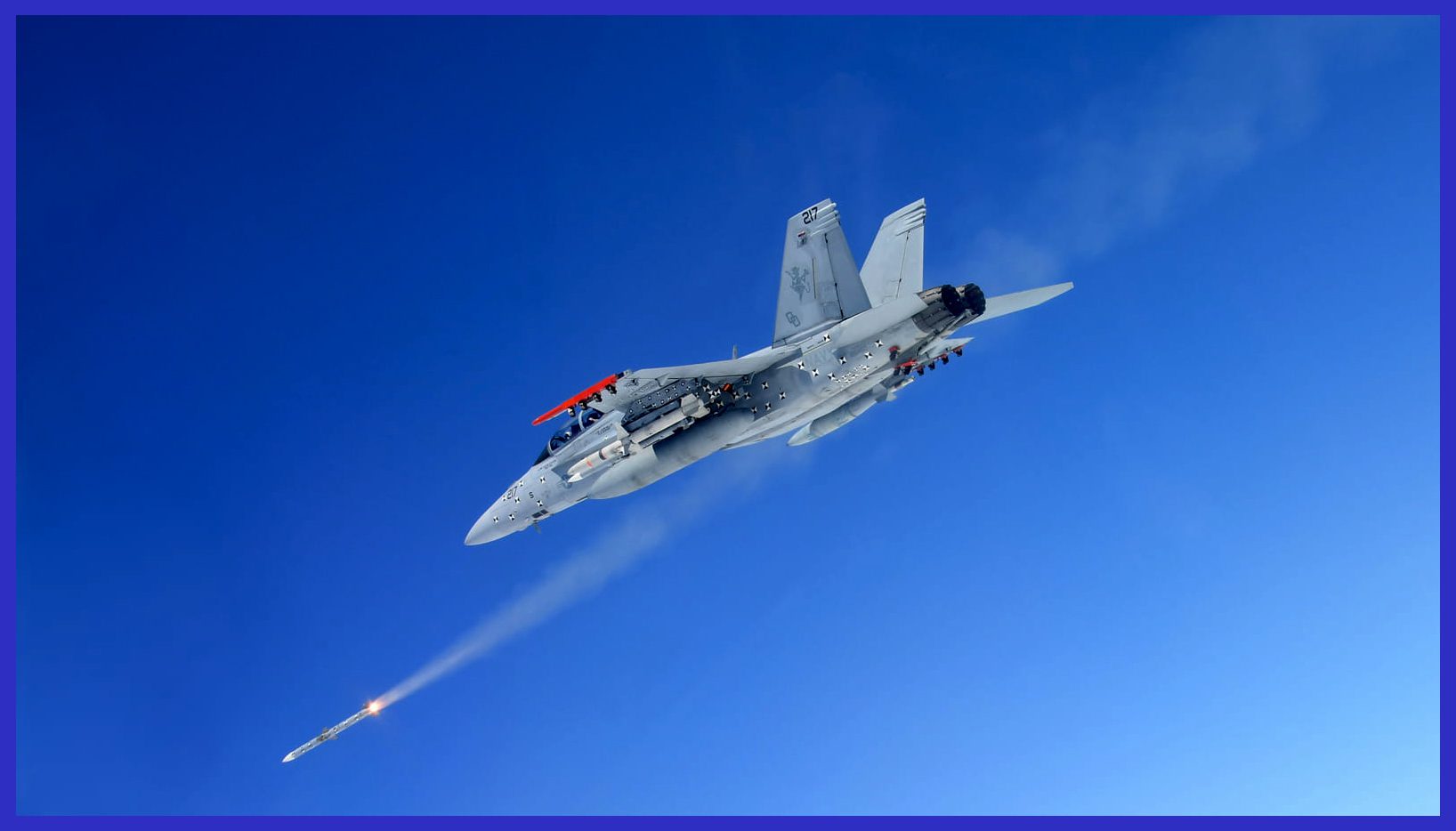 Photo Credit: Raytheon / An AMRAAM F3R missile is launched from an F:A-18F Super Hornet over the Point Mugu Sea Range during a test.