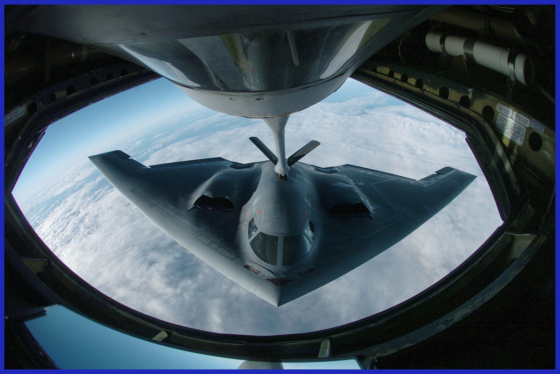 Photo Credit:USAF / A B-2 Spirit from the 509th Bomber Wing, Whiteman Air Force Base, Missouri, conducted air refueling operations with a KC-135 tanker from the 126th Air Refueling Wing, Illinois Air National Guard, during deployment at Andersen Air Force Base, Guam. These B-2 bombers arrived on Feb. 25 as part of a rotational presence, bolstering U.S. Pacific Command's commitment to regional security in the Asia-Pacific. Bomber aircraft have maintained a continuous presence on the island since February 2004.